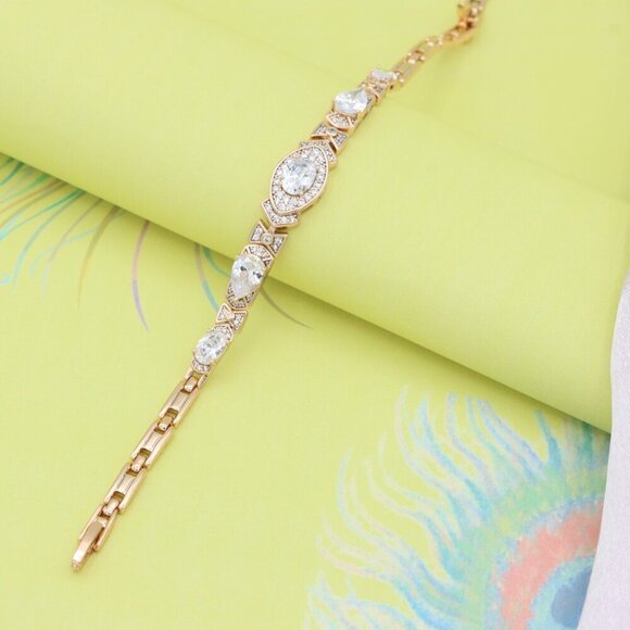 "Elegant Oval-Cut Crystal Rose Gold Bracelet with Bow Accents, XPBL0800 - Picture 4 of 11